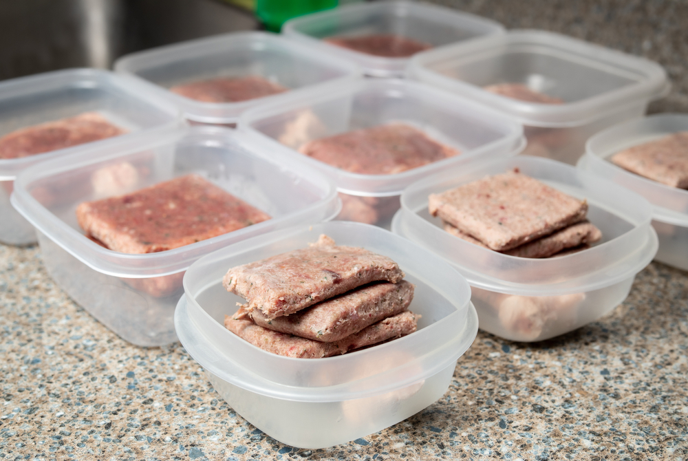 frozen pet food in containers
